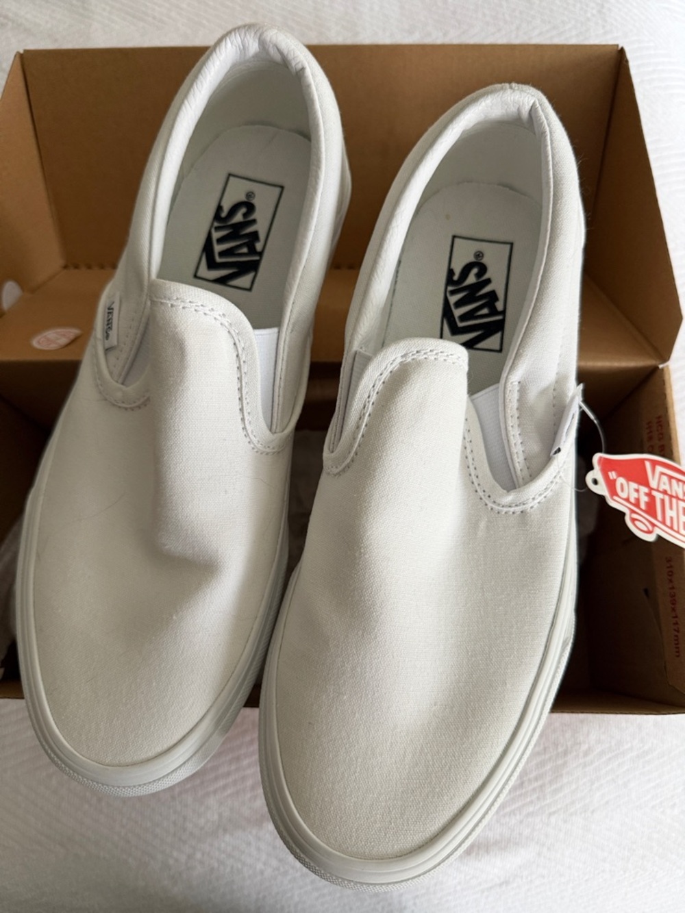 Vans White Slip-On Canvas Sneakers